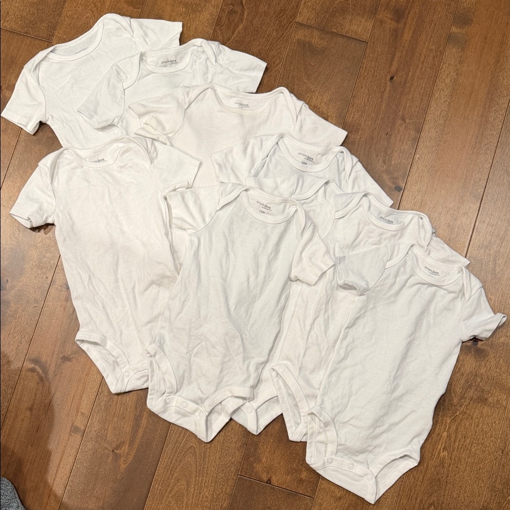 CARTER’S bundle of 9 white bodysuits onesies